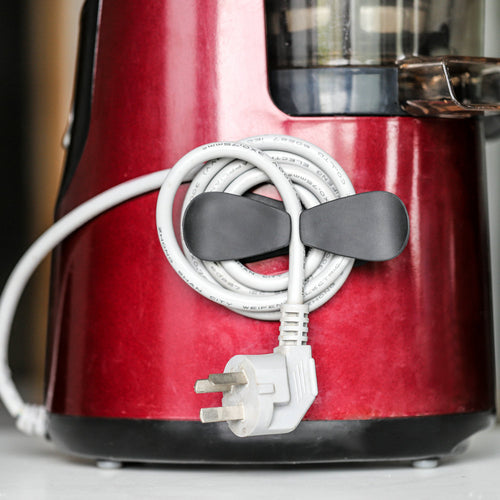 Cord organizer holding a blender cable