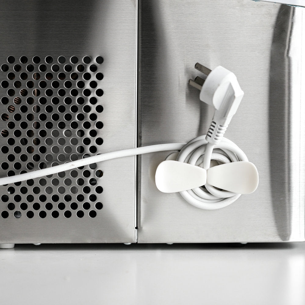 Cable tidied against the appliance