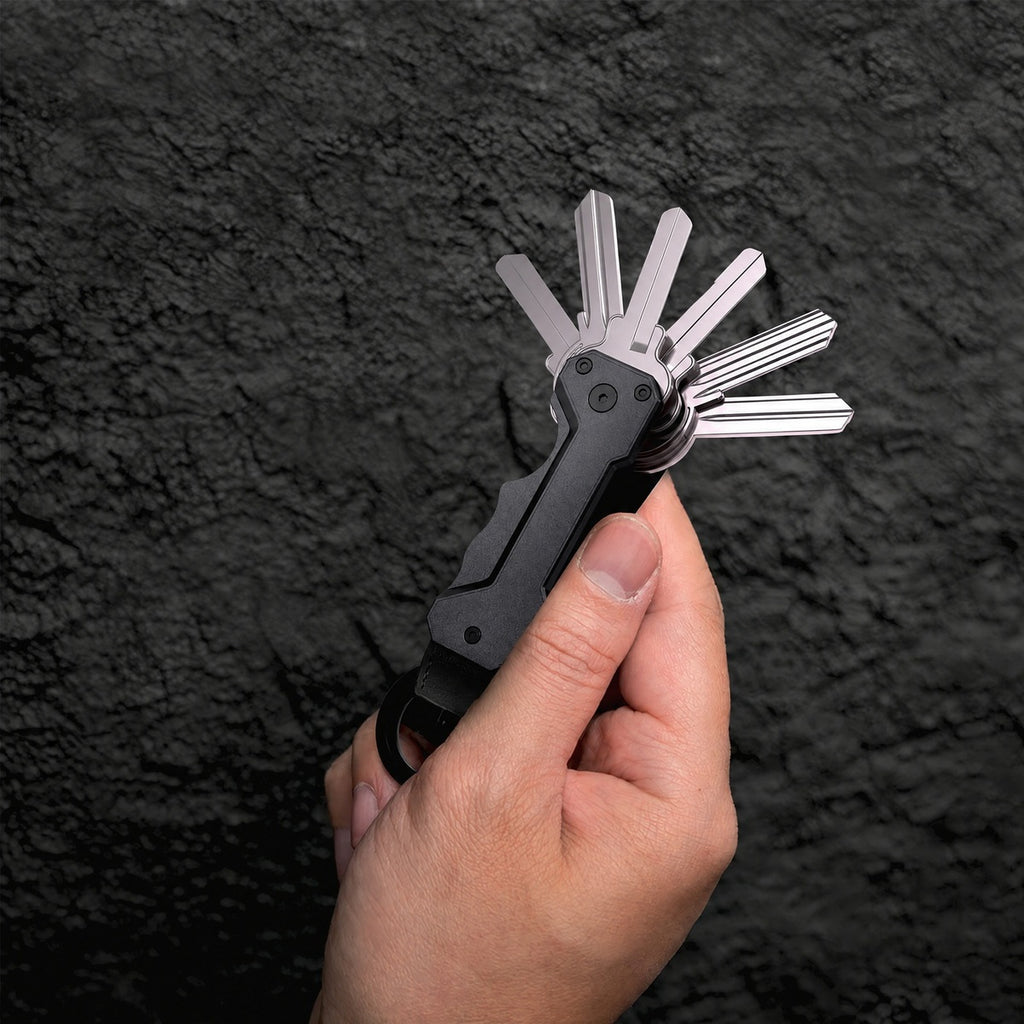 The Quiet — Aluminium Key Organizer — hand_dark.norm1200.jpg
