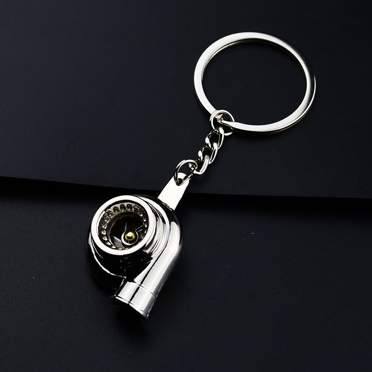 Car Parts Metal Keychain — Turbo, silver turbocharger with spinning wheel