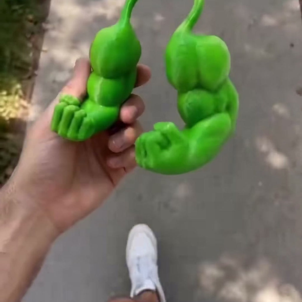 Cat wearing green muscle arms